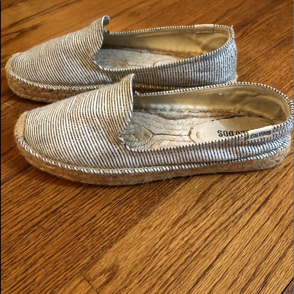 Blue and white ticking Soludos espadrilles.